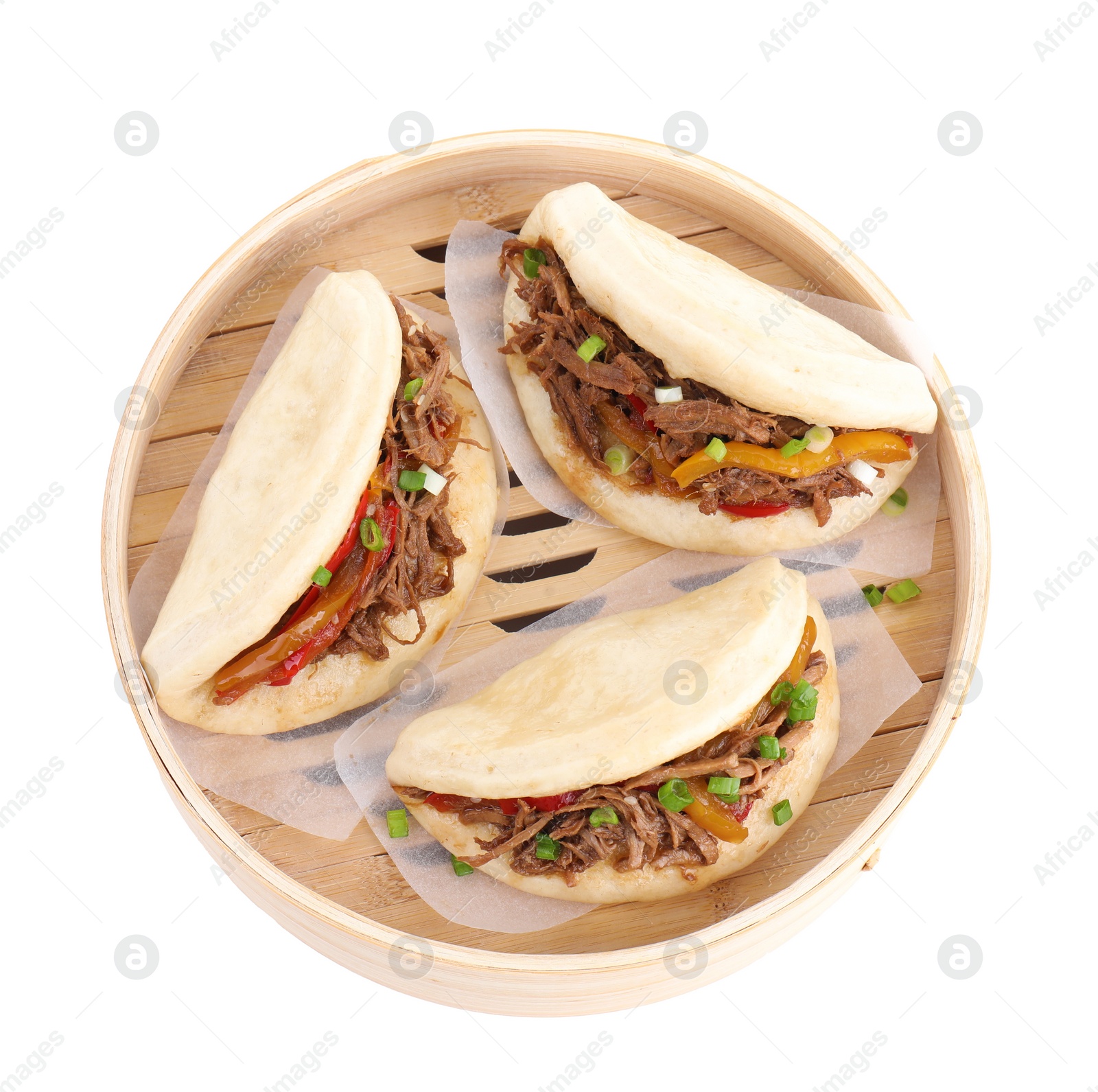 Photo of Delicious gua bao in bamboo steamer isolated on white, top view