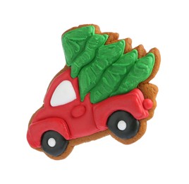 Photo of Christmas cookie in shape of car with fir tree isolated on white, top view