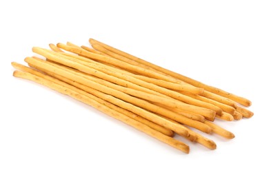 Fresh delicious grissini sticks on white background