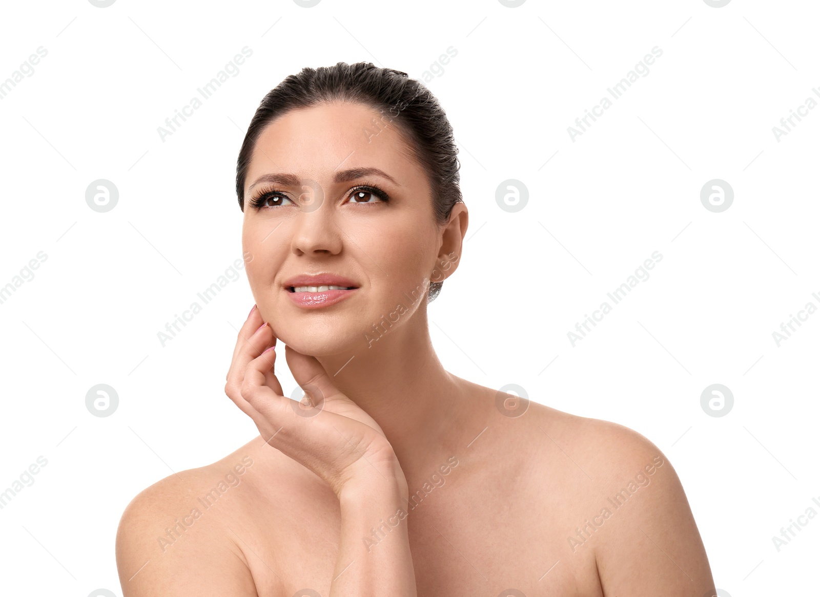 Photo of Beautiful woman with clean skin touching her face on white background