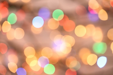 Photo of Beautiful glowing lights as background. Bokeh effect