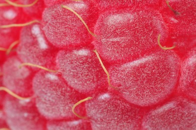 Photo of Texture of ripe raspberry as background, macro view. Fresh berry