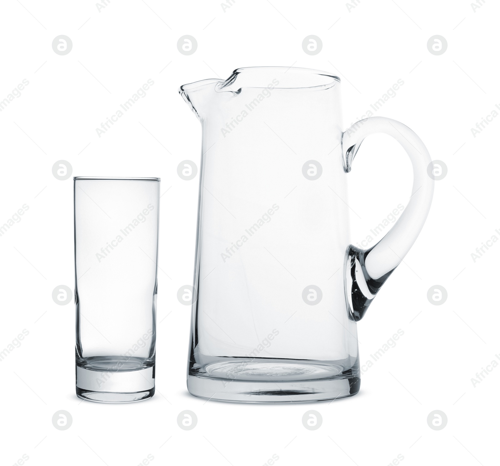 Image of Empty glass and jug isolated on white