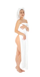 Full length portrait of young pretty woman with towels on white background