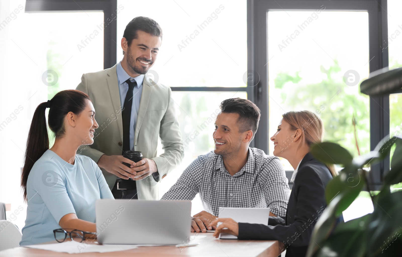 Photo of Office employees having business training at workplace