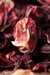 Photo of Dry hibiscus tea as background, closeup view