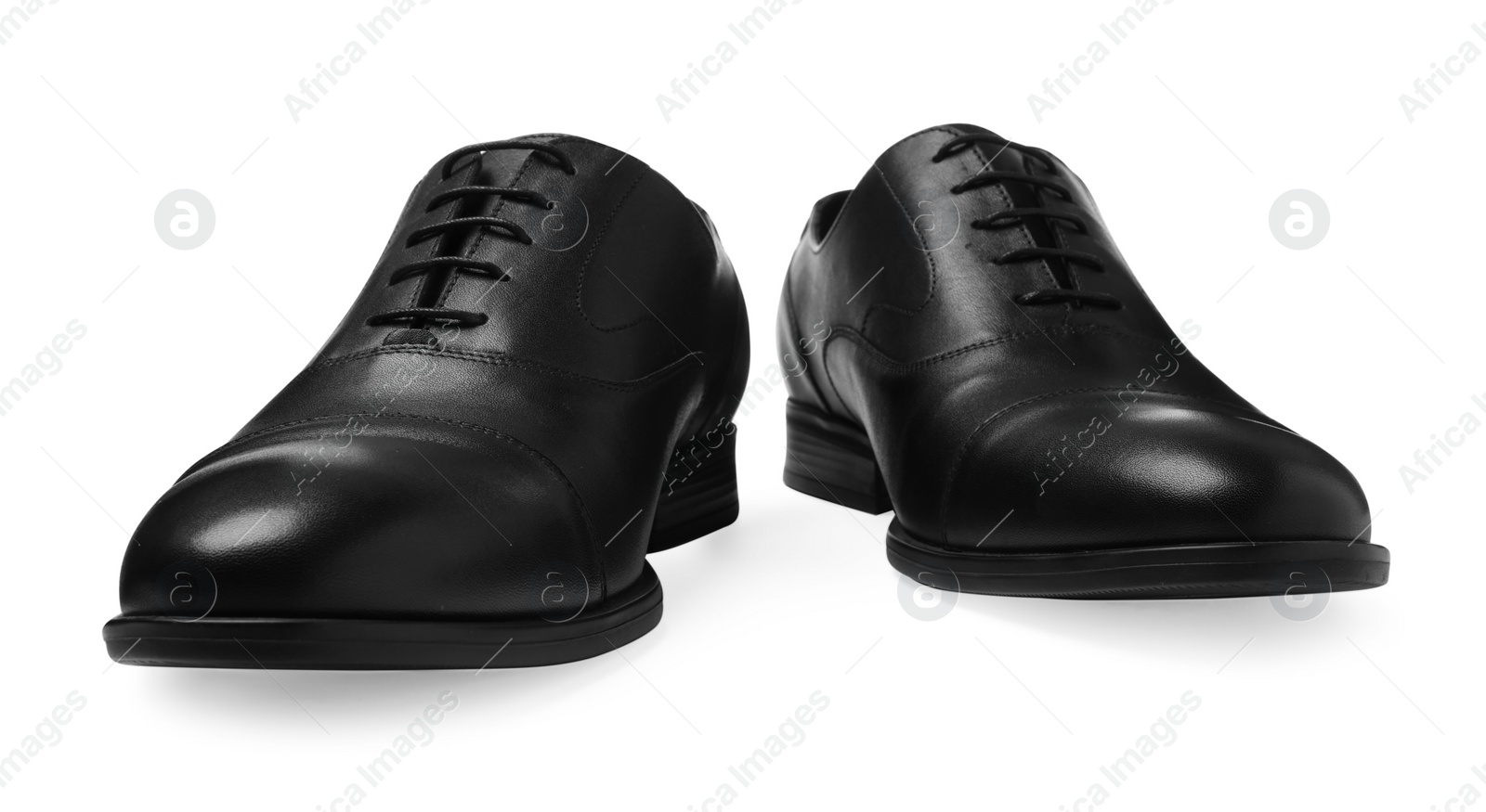 Photo of Pair of black leather men shoes isolated on white