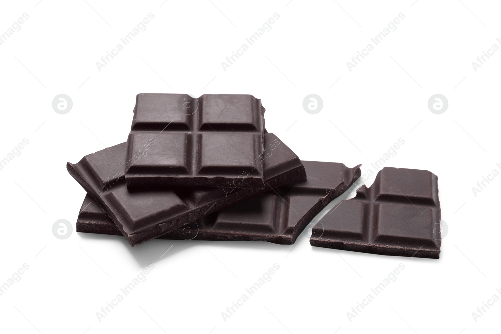 Photo of Pieces of delicious dark chocolate bars on white background