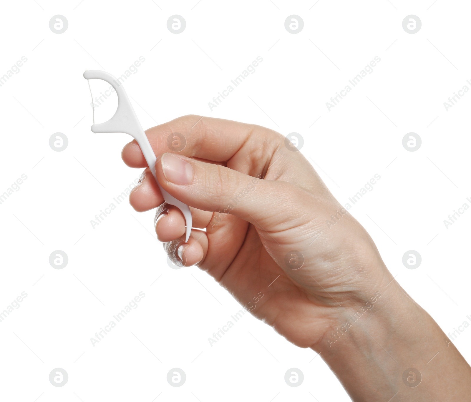 Photo of Woman holding dental floss pick on white background. Mouth and teeth care