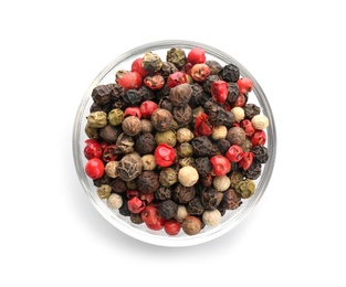 Photo of Glass bowl with different pepper grains on white background, top view