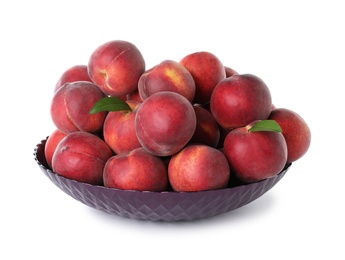 Photo of Bowl of delicious ripe peaches isolated on white