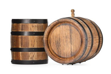 Photo of Two traditional wooden barrels isolated on white