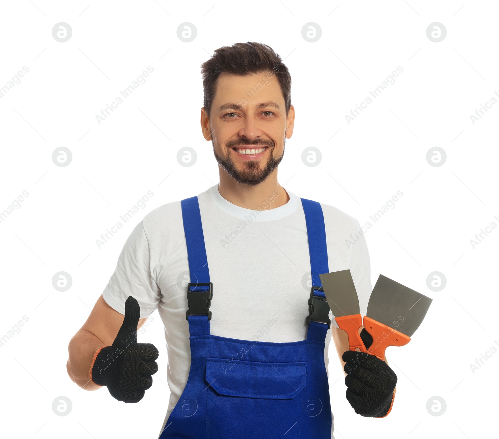 Photo of Professional worker with putty knives on white background