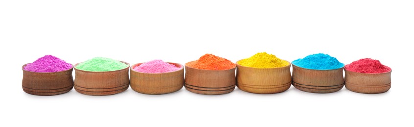 Photo of Colorful powder dyes in bowls on white background. Holi festival