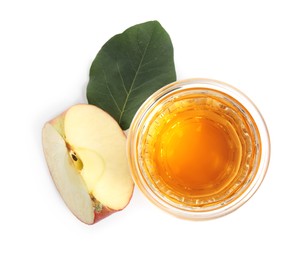 Photo of Glass with delicious cider, piece of ripe apple and leaf on white background, top view