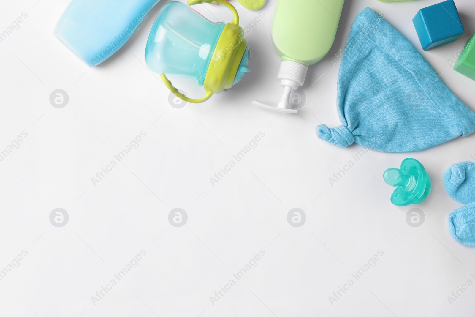 Photo of Flat lay composition with baby accessories and space for text on white background