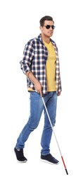 Photo of Blind man with long cane on white background