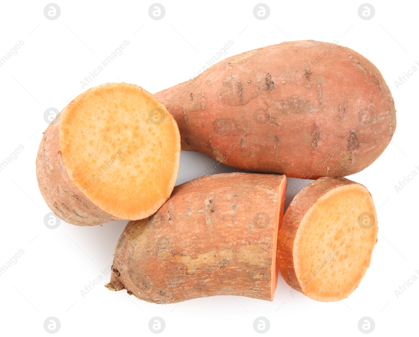 Photo of Whole and cut sweet potatoes on white background, top view