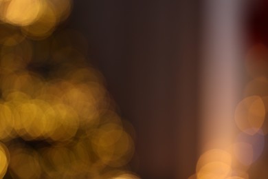 Photo of Blurred view of beautiful Christmas lights. Bokeh effect