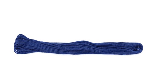 Photo of Bright blue embroidery thread on white background