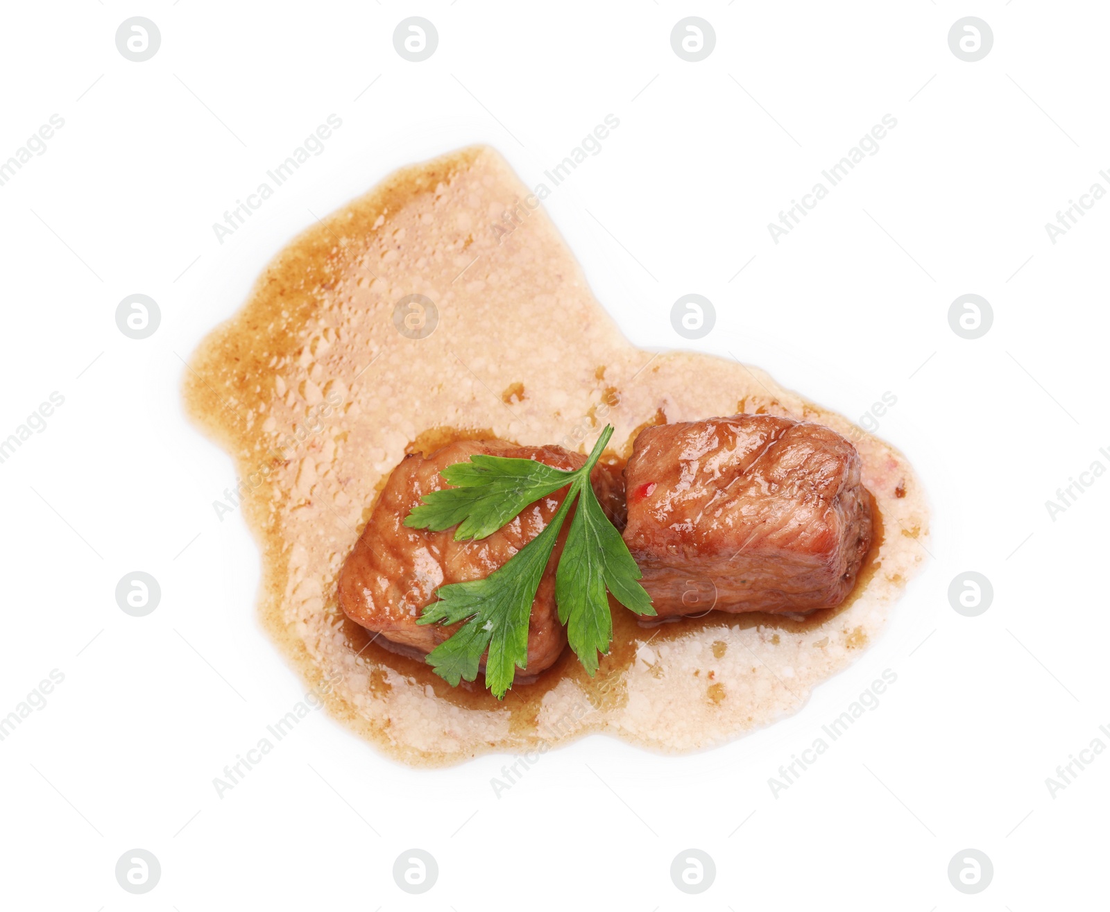 Photo of Pieces of delicious cooked beef and parsley isolated on white, top view. Tasty goulash