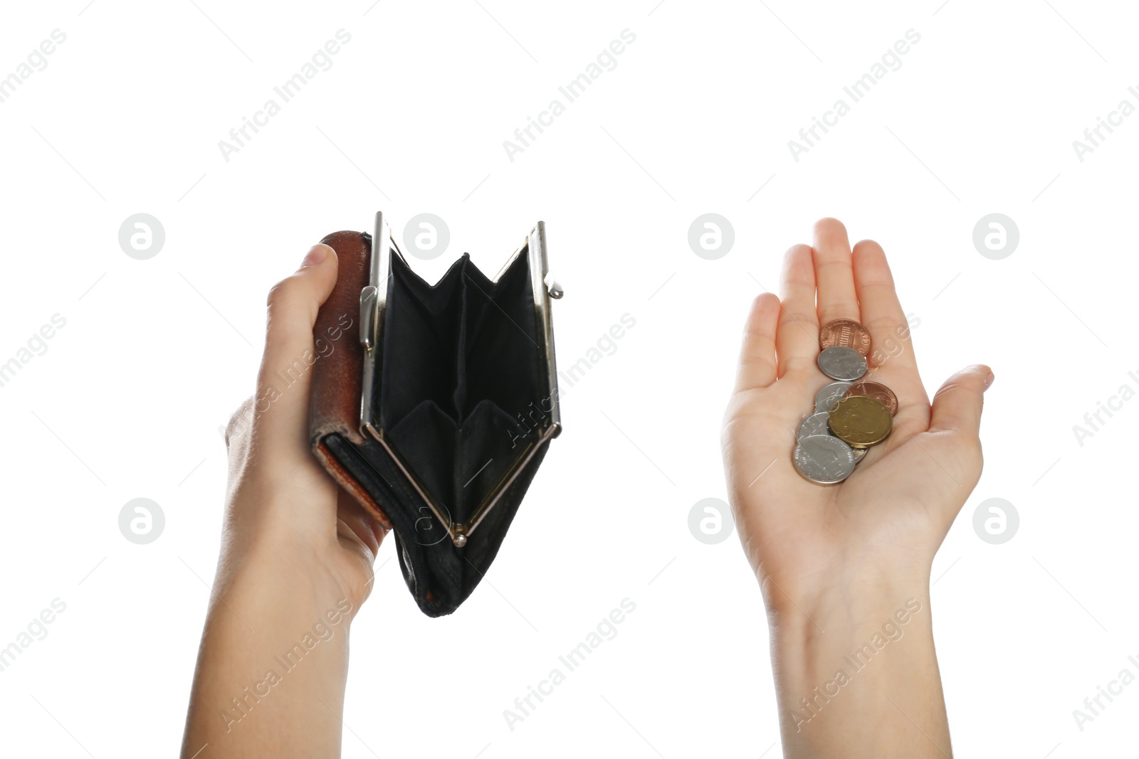 Photo of Poor woman holding empty wallet and coins on white background, closeup