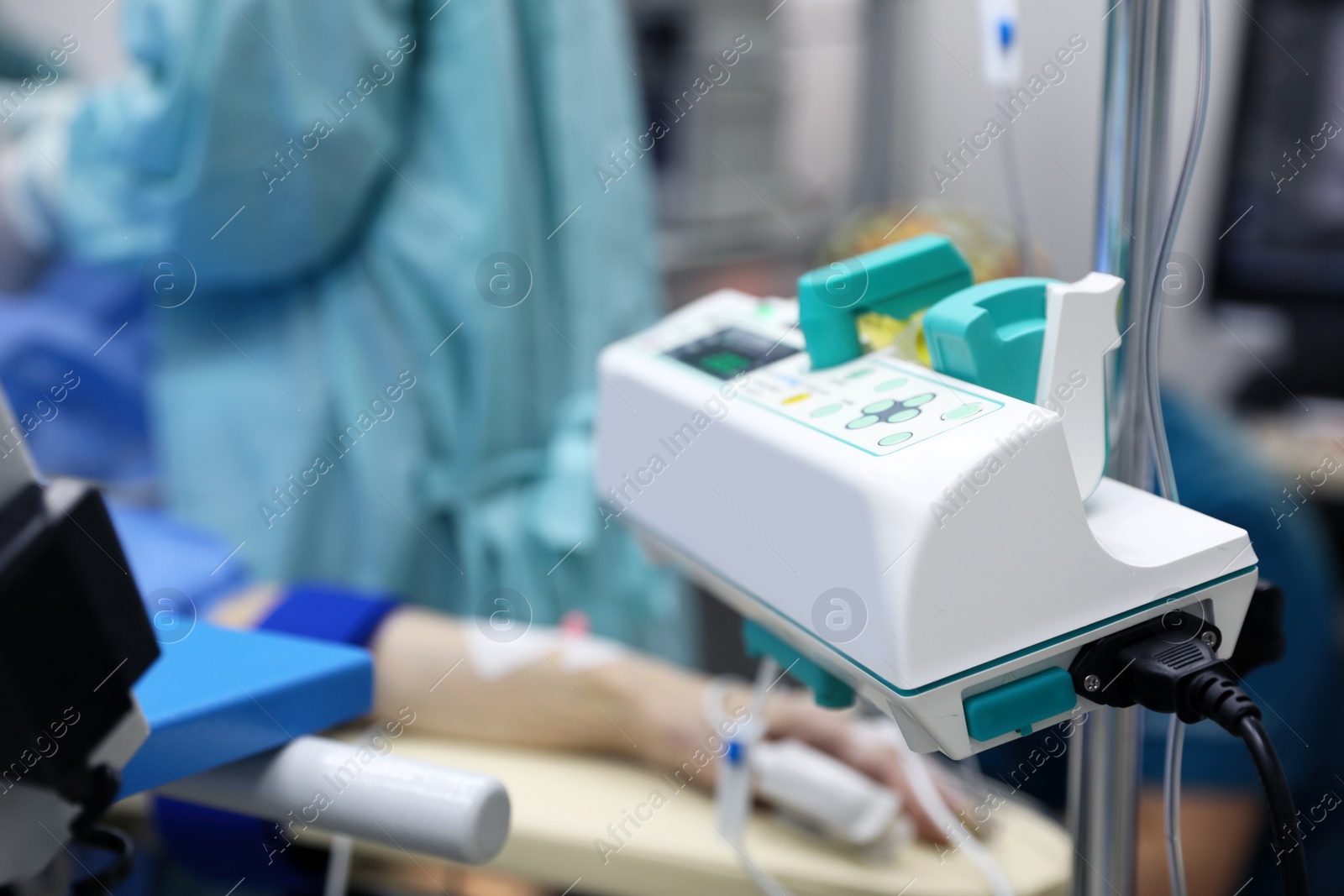 Photo of Medical equipment and blurred doctors in surgery room