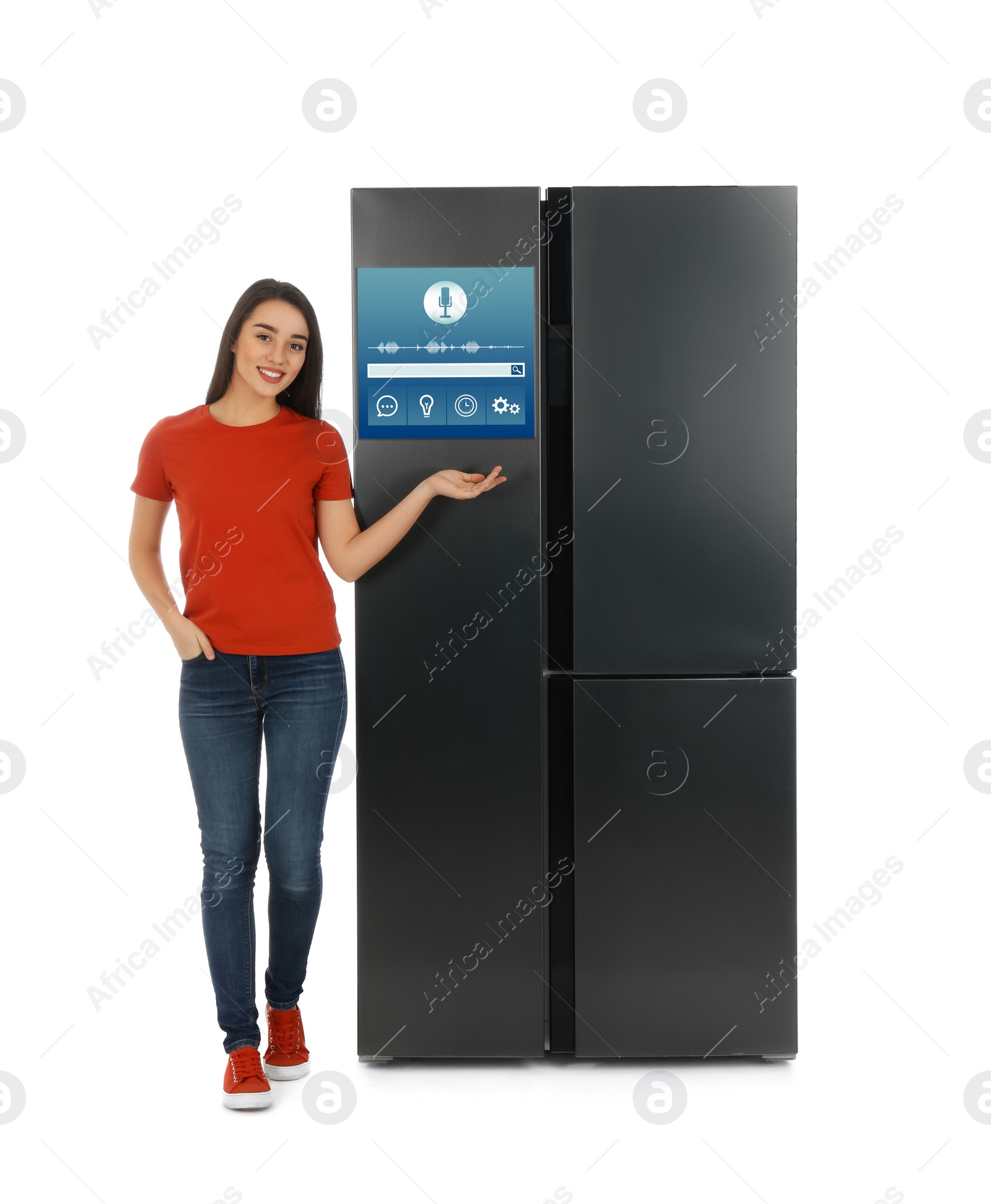 Image of Young woman near smart refrigerator on white background