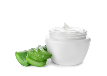 Photo of Jar with aloe vera balm and sliced leaves on white background