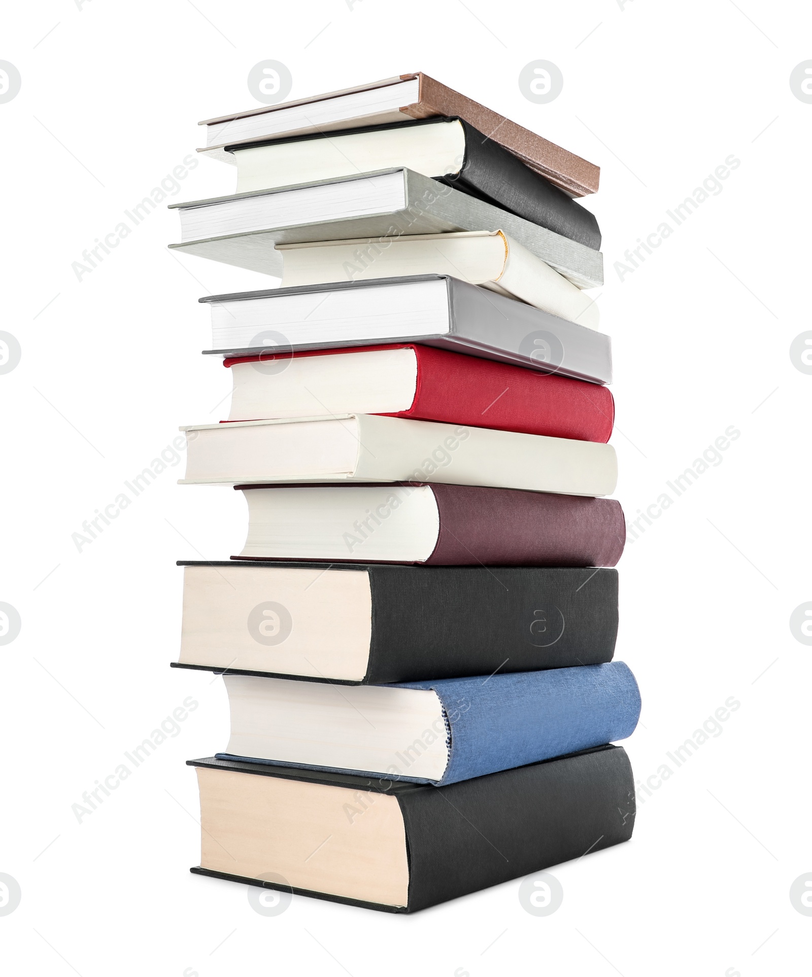 Photo of Many different books stacked on white background