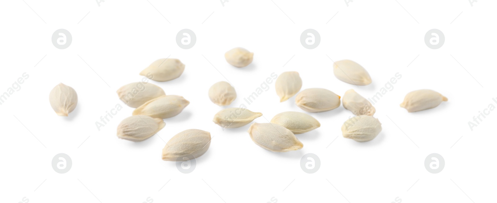 Photo of Many seeds of tangerine isolated on white