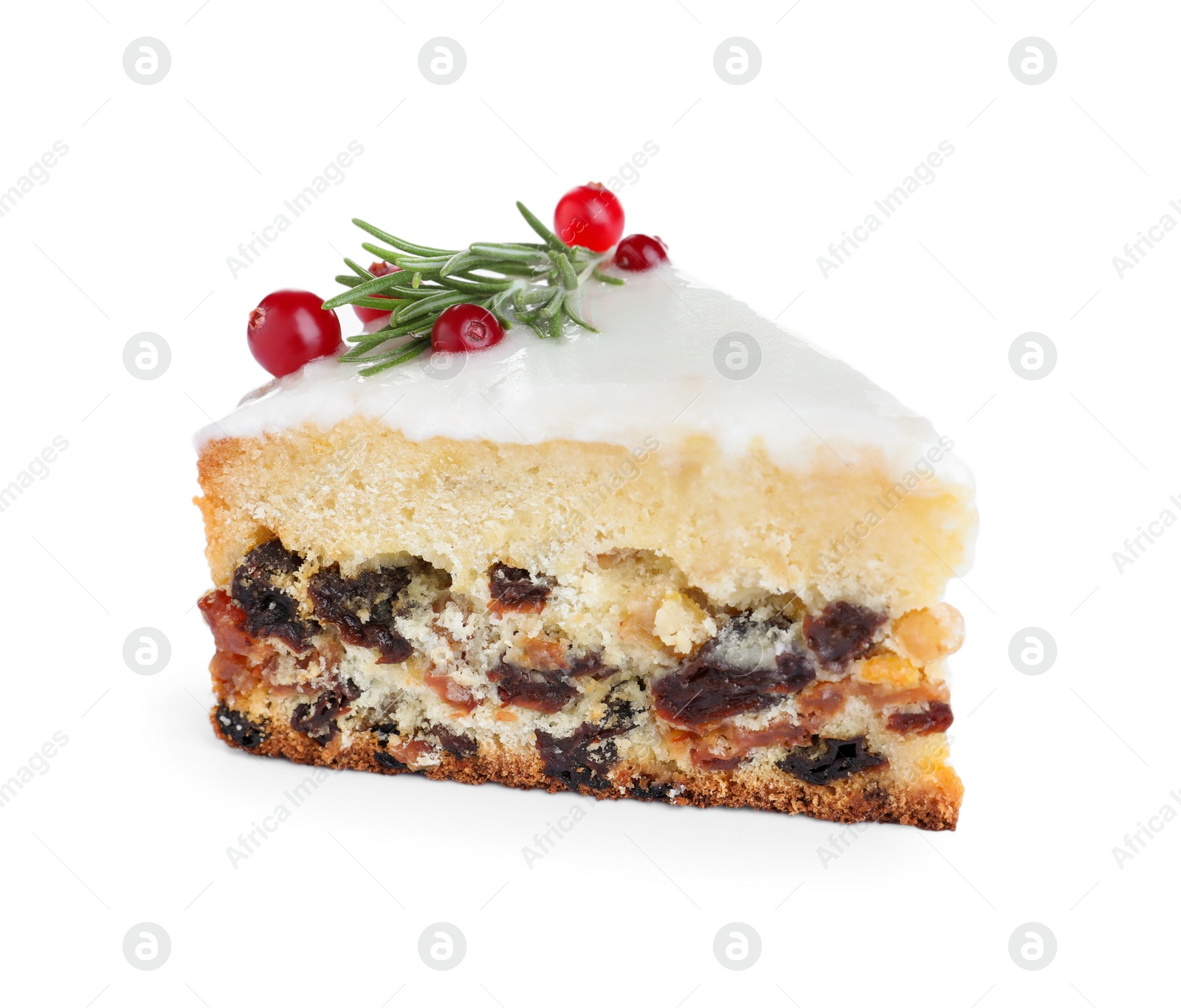 Photo of Slice of traditional Christmas cake decorated with rosemary and cranberries isolated on white