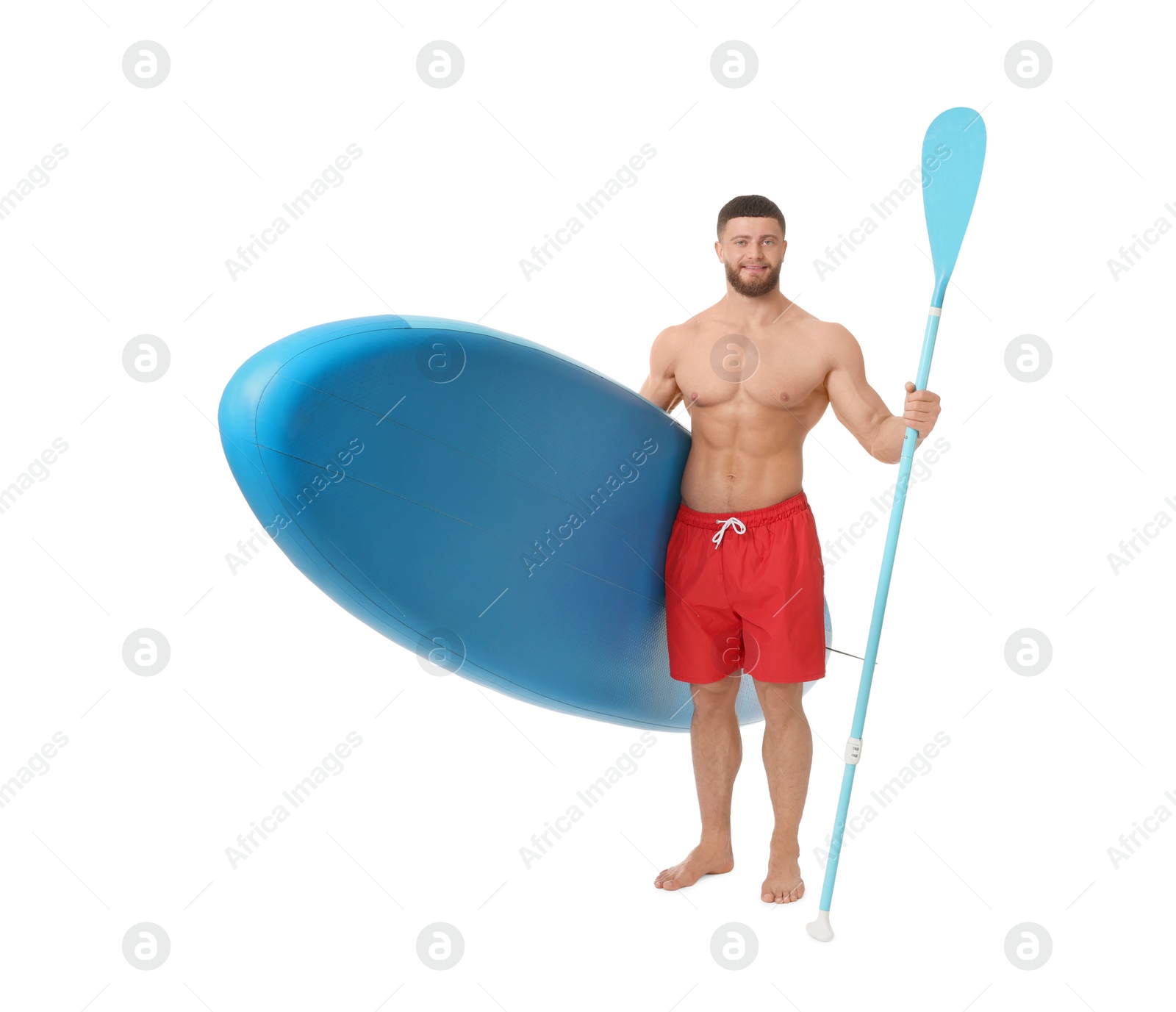 Photo of Happy man with blue SUP board and paddle on white background