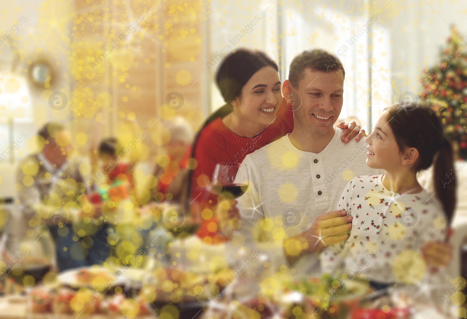 Image of Happy family enjoying festive dinner at home. Christmas celebration