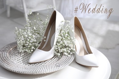 Hashtag Wedding, beautiful shoes, engagement ring and flowers on table indoors