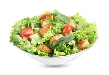 Delicious salad with chicken, cherry tomato and spinach isolated on white