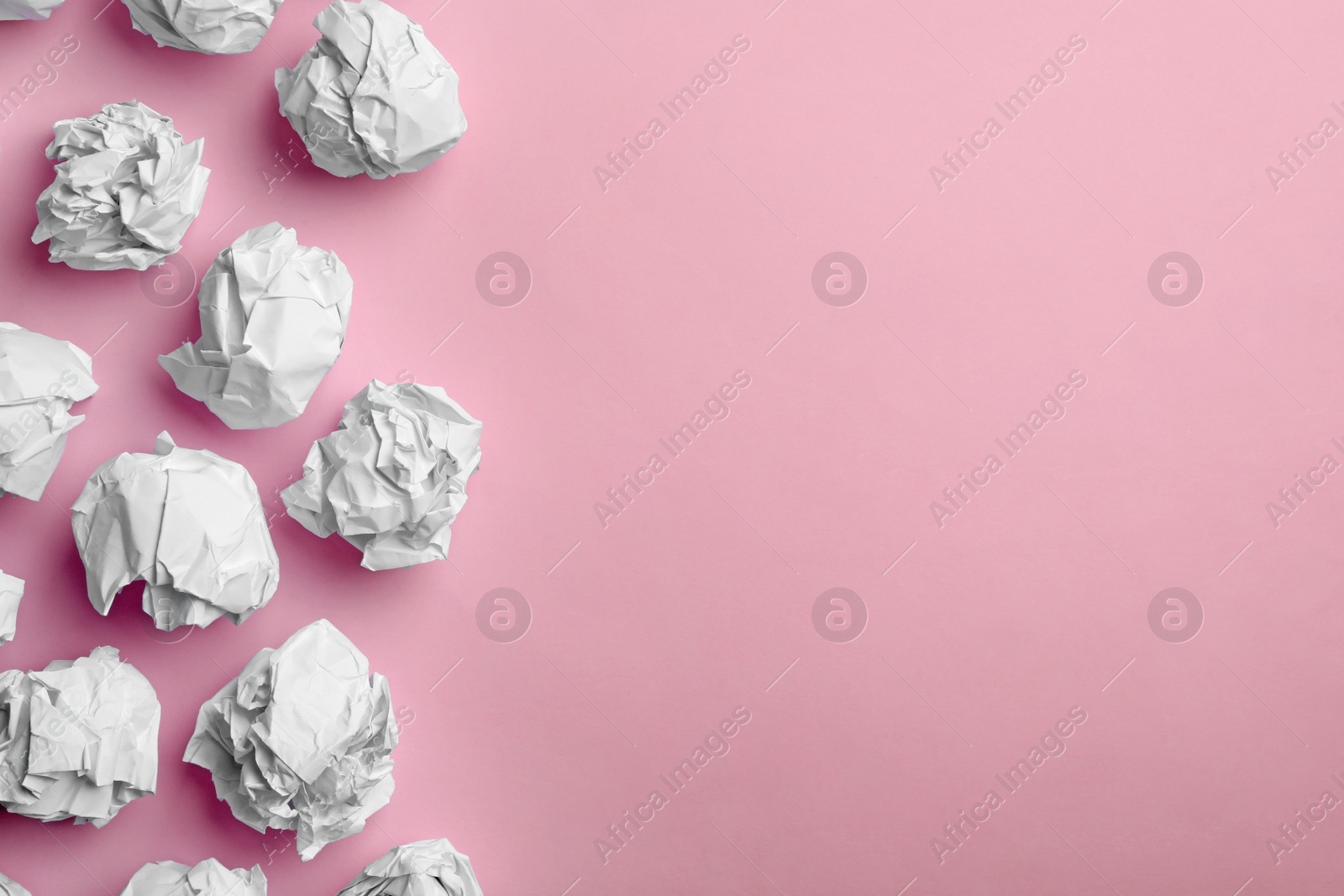 Photo of Paper balls on color background, flat lay. Space for text