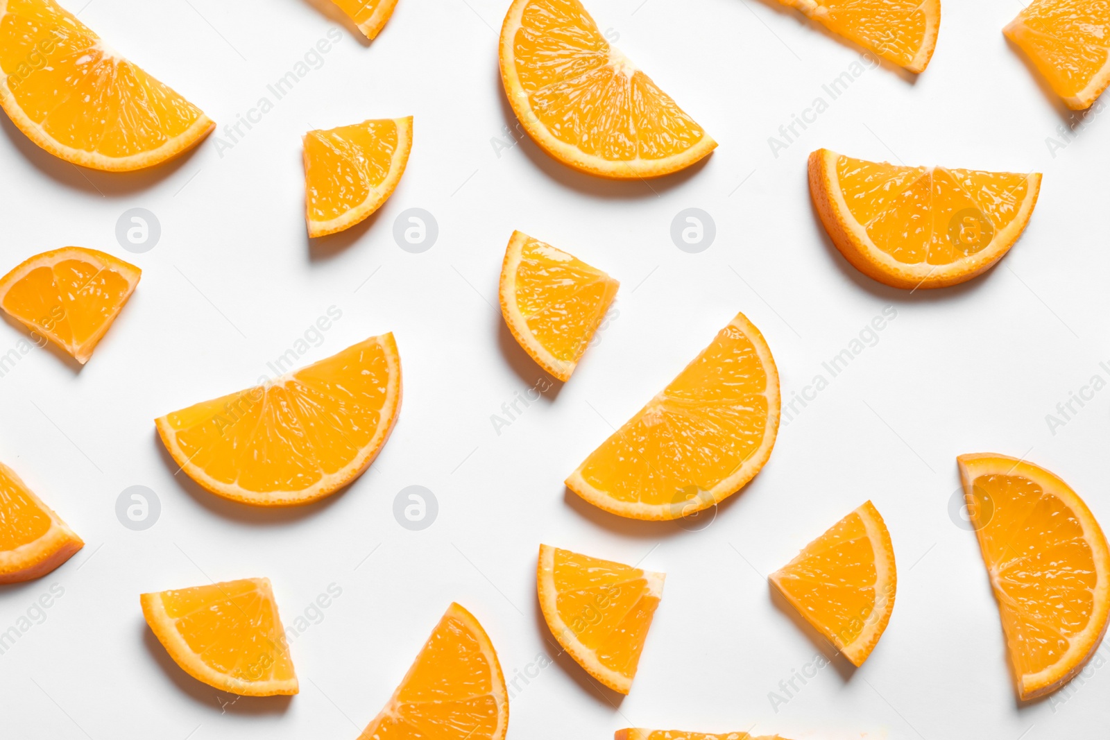 Photo of Composition with orange slices on white background, top view