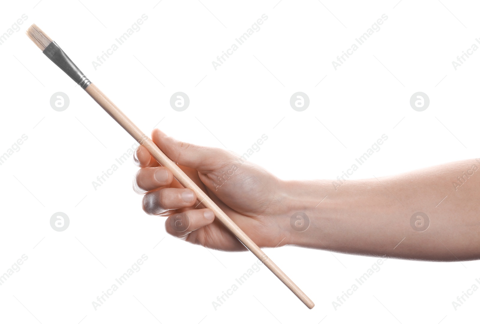 Photo of Man holding paint brush on white background, closeup