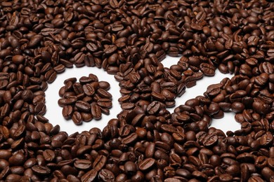 Photo of 0 percent in coffee beans on white background. Decaffeinated drink