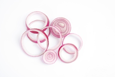 Photo of Fresh slices of red onion on white background