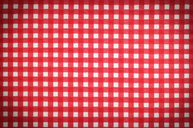 Image of Red and white tablecloth as background, vignette effect