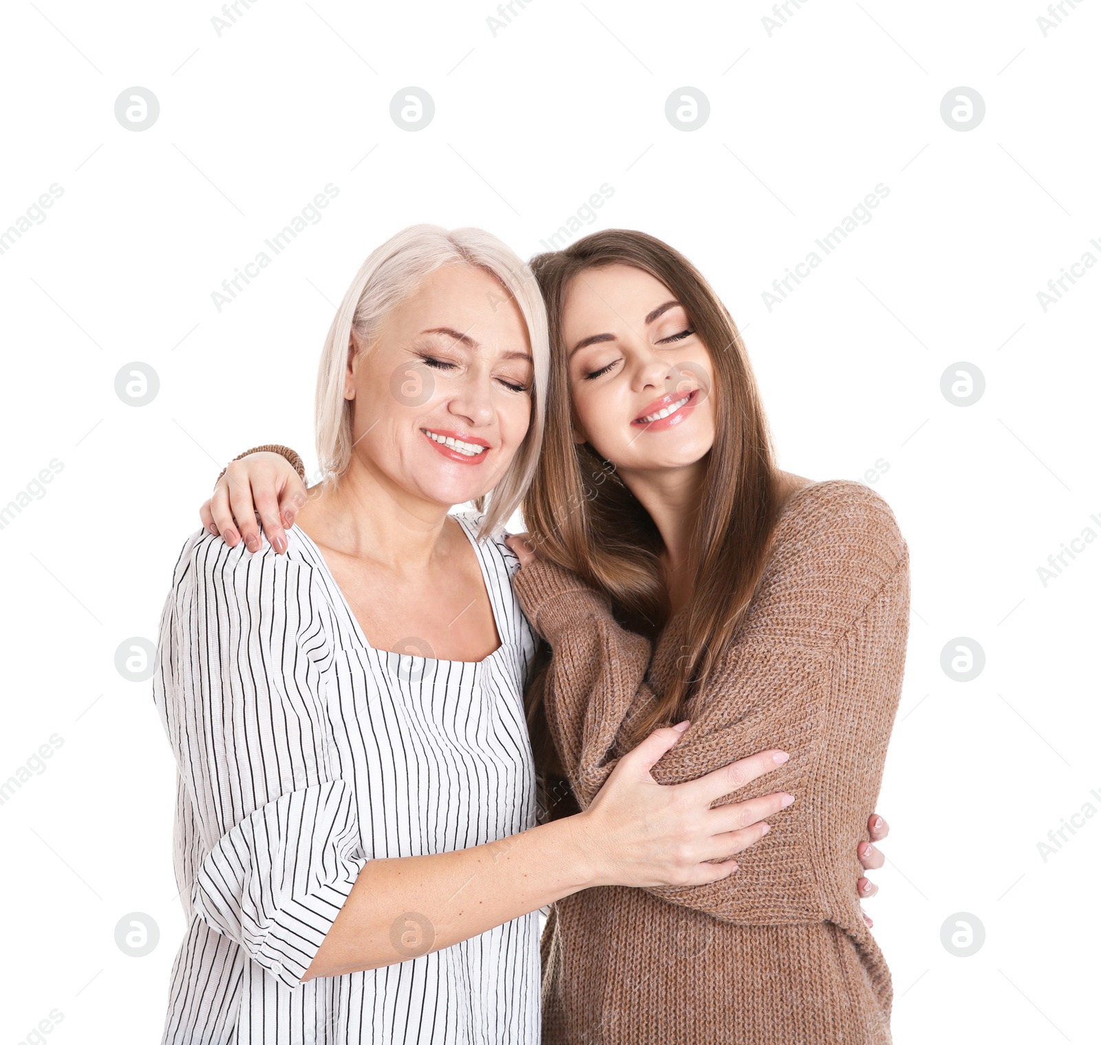 Photo of Portrait of young woman with her mature mother on white background