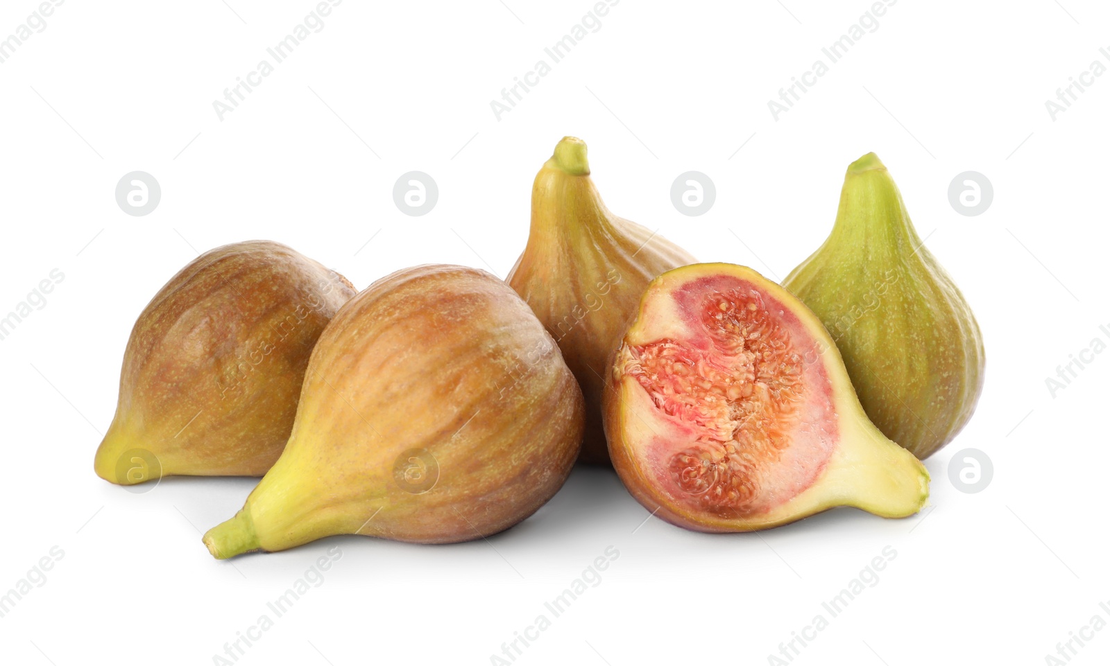 Photo of Whole and cut tasty figs isolated on white