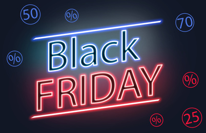 Text BLACK FRIDAY and shopping icons on dark background