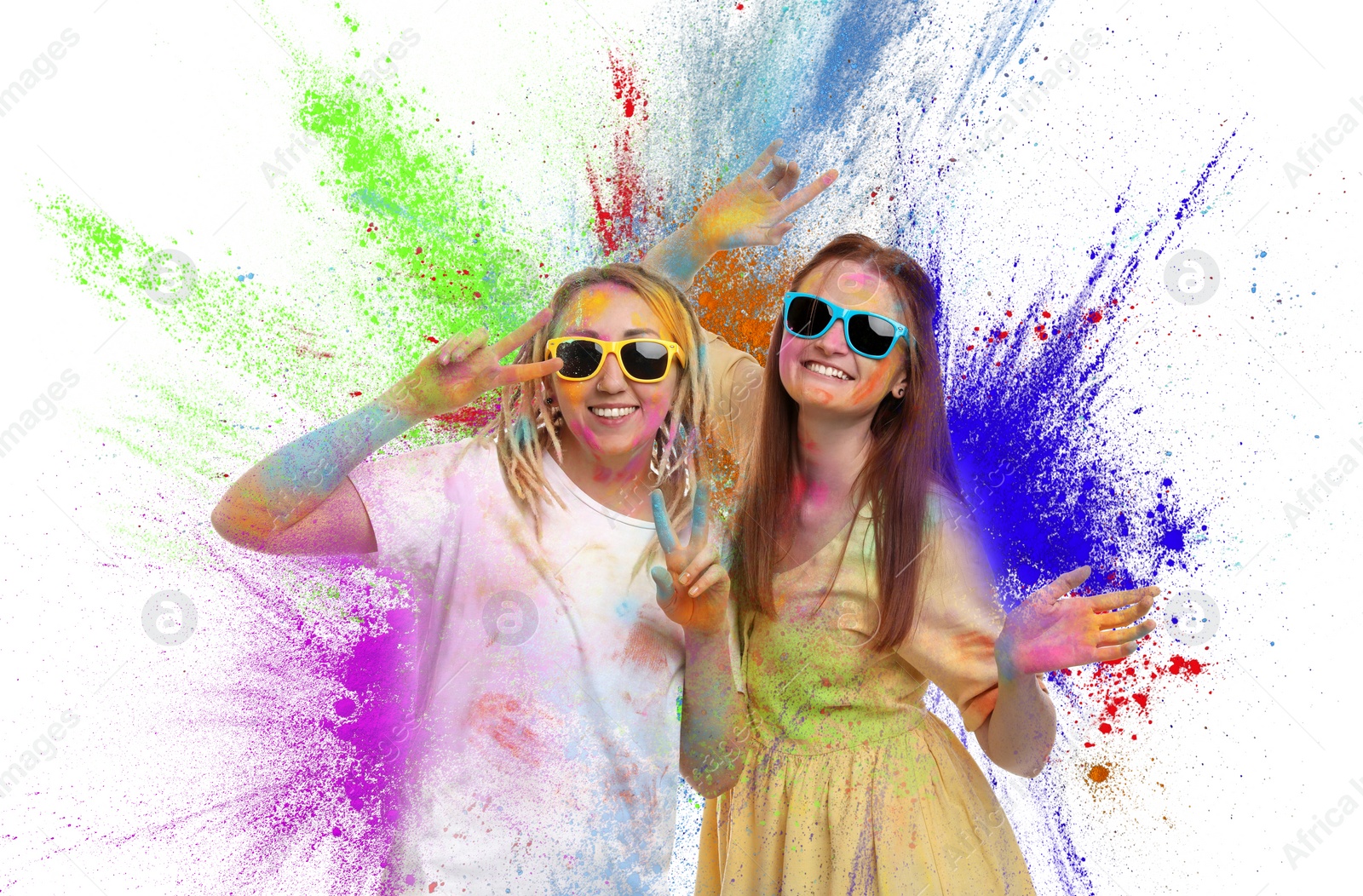 Image of Holi festival celebration. Happy women covered with colorful powder dyes on white background