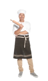 Photo of Mature male chef holding rolling pin on white background