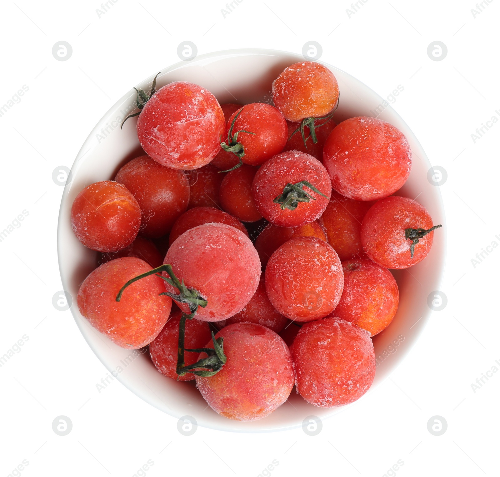 Photo of Frozen tomatoes in bowl isolated on white, top view. Vegetable preservation