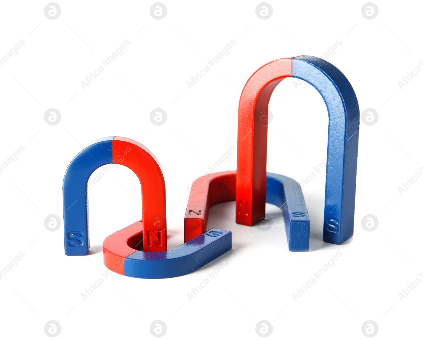 Photo of Red and blue horseshoe magnets isolated on white