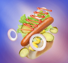 Hot dog ingredients in air on color gradient background